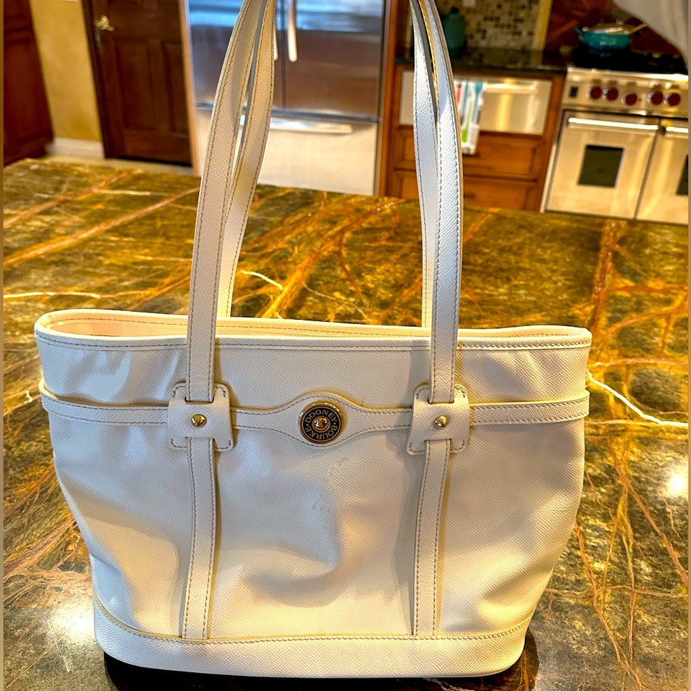 Dooney and Bourke white leather tote bag handbag with red interior barely used!!